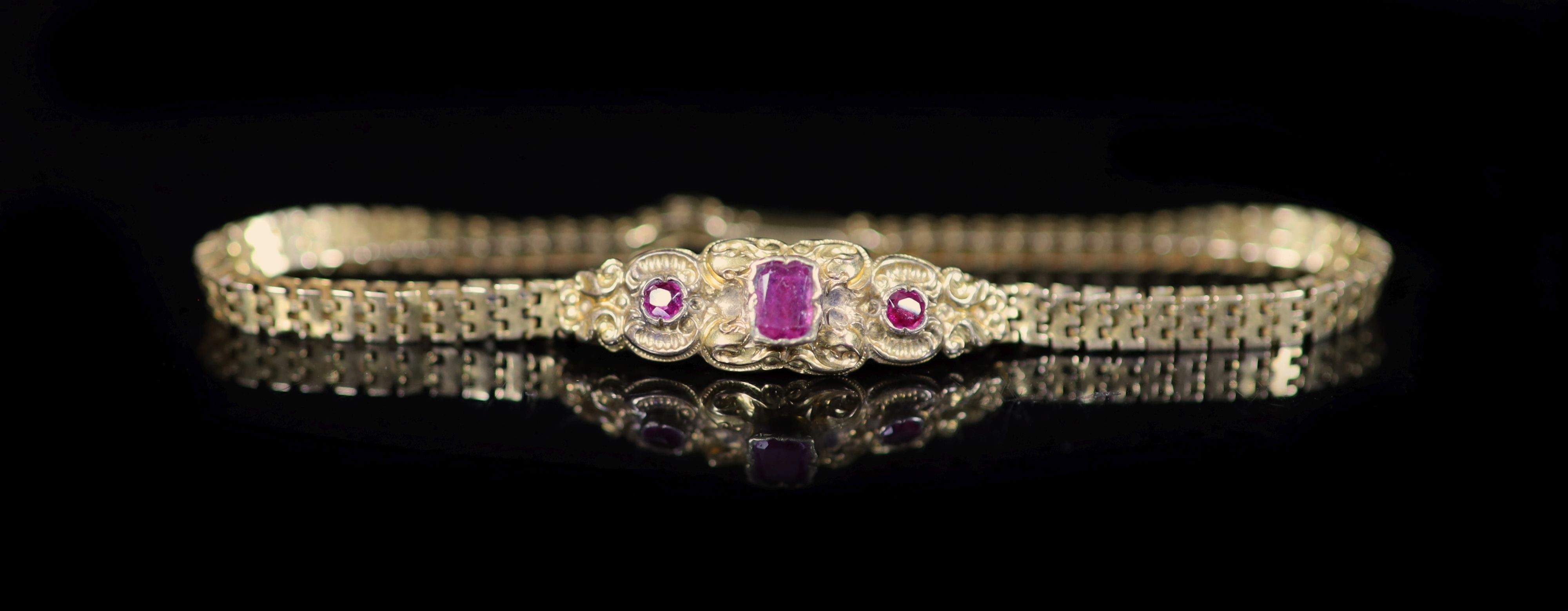 A 19th century French gold and three stone gem set bracelet